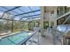 Outdoor living at its finest: pool, patio, grill, and screened-in lanai at 3272 Bayou Rd, Longboat Key, FL 34228