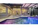 Stunning backyard with pool, patio, outdoor kitchen, and ample seating space at 3272 Bayou Rd, Longboat Key, FL 34228