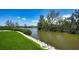 Beautiful waterfront view showcases lush greenery and serene water, perfect for nature lovers at 3272 Bayou Rd, Longboat Key, FL 34228