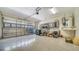 Spacious garage with ample storage, shelving units, and a durable concrete floor at 3623 Square West Ln # 5, Sarasota, FL 34238