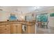 Kitchen with granite countertops and stainless steel appliances at 3623 Square West Ln # 5, Sarasota, FL 34238
