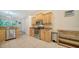 Modern kitchen featuring stainless steel appliances and bright cabinetry at 3623 Square West Ln # 5, Sarasota, FL 34238