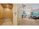 Living room with an elevator, comfortable seating, and a large window for natural light at 3623 Square West Ln # 5, Sarasota, FL 34238