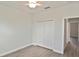 Bedroom featuring wood flooring and closet at 3812 Wenona Dr, North Port, FL 34288