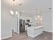 Modern kitchen with stainless steel appliances and a white marble island at 3812 Wenona Dr, North Port, FL 34288
