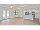Inviting living room flowing into a modern kitchen with stainless appliances at 3812 Wenona Dr, North Port, FL 34288