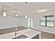 Open concept living space with marble countertops and lots of natural light at 3812 Wenona Dr, North Port, FL 34288