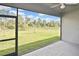 View from the screened in lanai to the large backyard at 3812 Wenona Dr, North Port, FL 34288