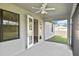 Screened in patio with fan, overlooking the backyard at 3812 Wenona Dr, North Port, FL 34288