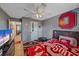 This bedroom offers ample space, featuring a fan, neutral walls, and a comfortable layout at 4053 Lancaster Dr, Sarasota, FL 34241