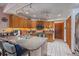 The well-lit kitchen features granite countertops, a breakfast bar, and a functional layout at 4053 Lancaster Dr, Sarasota, FL 34241