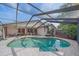 An inviting in-ground pool surrounded by a screened enclosure and patio area at 4053 Lancaster Dr, Sarasota, FL 34241
