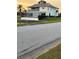 Exterior of home featuring a screened-in porch, balcony, and water access providing outdoor living and scenic views at 4066 Amberjack Dr, Hernando Beach, FL 34607