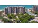 Beautiful high-rise condo with landscaped grounds, a pool, and beach access at 415 L Ambiance Dr # D306, Longboat Key, FL 34228