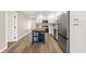 Updated kitchen features stainless steel appliances, butcher block island, and new flooring at 420 63Rd St # B East, Holmes Beach, FL 34217