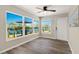 Sun Room with walls of windows and water views is perfect for enjoying the outdoors from inside at 420 63Rd St # B East, Holmes Beach, FL 34217