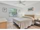 Comfortable bedroom with neutral tones, offering a serene atmosphere, brightened by natural light and tasteful decor at 4315 45Th W Ave # 103, Bradenton, FL 34210