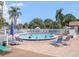 Enjoy a refreshing swim in the community pool surrounded by lush landscaping and comfortable lounge chairs at 4315 45Th W Ave # 103, Bradenton, FL 34210