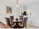 Cozy dining area featuring a round glass table with four leather chairs at 4315 45Th W Ave # 103, Bradenton, FL 34210
