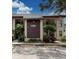 Inviting condo exterior features a neutral color scheme and manicured landscaping at 4315 45Th W Ave # 103, Bradenton, FL 34210