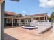 Community hot tub area offers relaxation with covered grilling and outdoor dining, perfect for entertaining friends and Gathering at 4315 45Th W Ave # 103, Bradenton, FL 34210