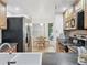 Modern kitchen with stainless steel appliances and an adjacent breakfast nook at 4315 45Th W Ave # 103, Bradenton, FL 34210