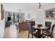 Relaxing living room with comfortable seating, ceiling fan, and sliding glass doors to outdoor patio at 4315 45Th W Ave # 103, Bradenton, FL 34210