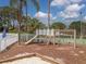 Community playground area with a slide, swing set, and sandbox, perfect for children to play and explore at 4315 45Th W Ave # 103, Bradenton, FL 34210