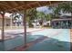 Enjoy the community shuffleboard area, surrounded by lush landscaping and nearby seating, for recreational fun at 4315 45Th W Ave # 103, Bradenton, FL 34210
