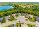 Desirable neighborhood with manicured lawns, surrounded by lush landscaping and serene lakes at 437 Chantilly Trl, Bradenton, FL 34212