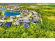 Beautiful community with well-maintained homes, lush greenery, and scenic lakes at 437 Chantilly Trl, Bradenton, FL 34212