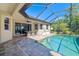 Beautiful pool and lanai area, perfect for outdoor dining and relaxing poolside at 437 Chantilly Trl, Bradenton, FL 34212