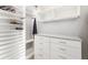 Organized walk-in closet with shelves, drawers, and hanging space at 437 Chantilly Trl, Bradenton, FL 34212