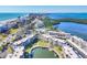 Breathtaking aerial view captures waterfront condo complex with beach access and scenic waterways at 4380 Exeter Dr # 304, Longboat Key, FL 34228