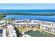 Beautiful waterfront condos offer serene views of bay, lush landscaping, and a private community boat launch at 4380 Exeter Dr # 304, Longboat Key, FL 34228