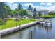 Waterfront view of a dock and boardwalk, showcasing the community's waterfront access at 4380 Exeter Dr # 304, Longboat Key, FL 34228
