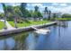 Community dock and kayak launch providing direct access to the water for residents at 4380 Exeter Dr # 304, Longboat Key, FL 34228