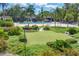 Enjoy the putting green, community pool, and lush landscaping for a complete outdoor living experience at 4380 Exeter Dr # 304, Longboat Key, FL 34228