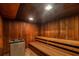Relaxing sauna featuring wooden benches and panels for a serene and therapeutic experience at 4380 Exeter Dr # 304, Longboat Key, FL 34228