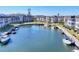 Picturesque waterfront community with boat slips, lush landscaping, and inviting walkways at 4380 Exeter Dr # 304, Longboat Key, FL 34228