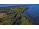 Breathtaking aerial view of lush greenery and winding waterways with turquoise waters at 4610 13Th W St, Palmetto, FL 34221