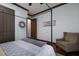 Comfortable bedroom boasts a tranquil atmosphere, neutral color palette, and hardwood floors, creating a peaceful retreat at 4610 13Th W St, Palmetto, FL 34221