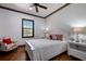 Comfortable bedroom with hardwood floors, natural light, and white accents at 4610 13Th W St, Palmetto, FL 34221