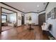 The foyer offers an elegant entryway with hardwood floors, neutral paint, and decorative lighting at 4610 13Th W St, Palmetto, FL 34221