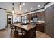 Open-concept kitchen with breakfast bar and hardwood floors at 4610 13Th W St, Palmetto, FL 34221