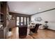 This cozy living room features hardwood floors, recessed lighting, neutral paint, and access to the patio at 4610 13Th W St, Palmetto, FL 34221