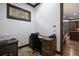 Bright office space with a wooden desk, ample storage, and natural light, perfect for productivity and focus at 4610 13Th W St, Palmetto, FL 34221