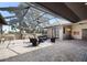 Enclosed patio with pavers, seating, fireplace and ceiling fan provides an excellent outdoor living space at 4610 13Th W St, Palmetto, FL 34221