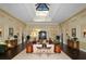 Lobby with high ceilings, skylight, and elegant furnishings at 4832 Carrington Cir, Sarasota, FL 34243