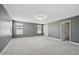 Large bedroom featuring plush carpet and chandelier at 4951 Oyster Pearl St, Lakewood Ranch, FL 34211